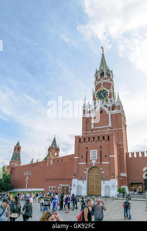 Moscow, Russia - July 07, 2016: People on the Red Square in front of the gate Borovitsky of the Kremlin Spassky Tower Stock Photo