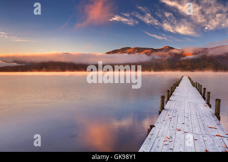 Lake Chuzenji (Chuzenjiko, 中禅寺湖) near Nikko in Japan. Photographed on a beautiful still morning in autumn at sunrise. Stock Photo