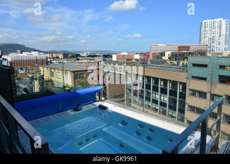 View over theMerchant Hotel plunge pool to the City of belfast Stock Photo