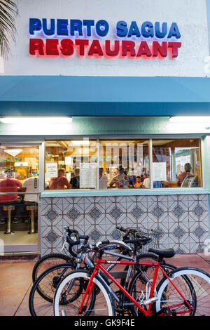 Miami Beach Florida,South Beach,Collins Avenue,Puerto Sagua Restaurant restaurants food dining cafe cafes,dining,Cuban cuisine food,exterior,lit sign Stock Photo