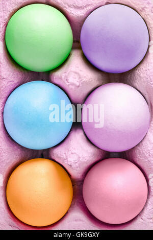 colorful easter eggs in egg box Stock Photo