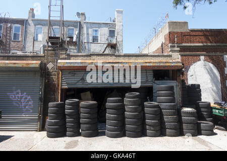 A Pile Of Used Tyres At A Garage In Asturias Spain Stock Photo