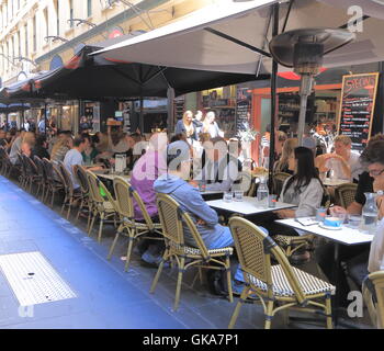 People dine at Degraves Street in Melbourne Australia. Stock Photo