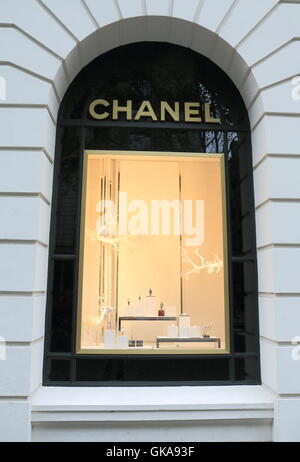 Chanel products display, French privately held company that specializes in ready-to-wear clothes luxury goods. Stock Photo