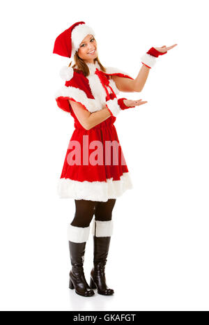 Caucasian female dressed in a cute Santa elf outfit. Stock Photo