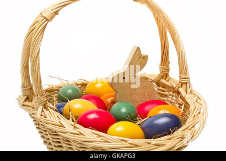 colorful easter eggs and a bunny in the nest Stock Photo