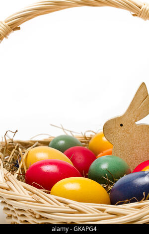 colorful easter eggs and a bunny in the nest Stock Photo