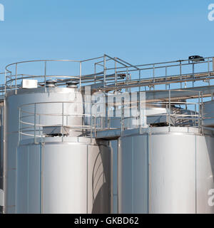 Stainless steel silos . For a milk processing plant. Stock Photo