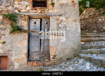 Old wooden door in Corvara, Abruzzo, Italy. Stock Photo
