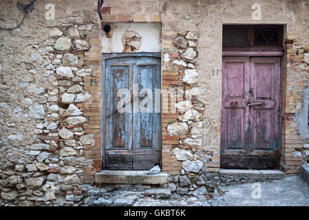 Old wooden doors in Corvara, Abruzzo, Italy. Stock Photo