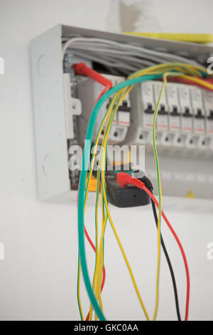 Electrical measurements in new cabinet with multimeter Stock Photo