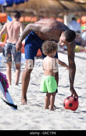 kevin-prince-boateng-with-his-wife-melissa-satta-and-their-son-maddox