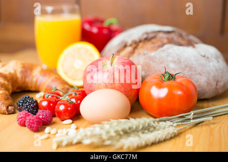 different kinds of bread and a variety of foods Stock Photo
