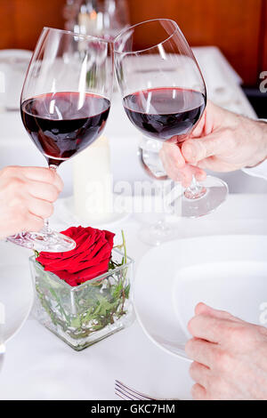 waiter serving a young couple after-dinner coffee Stock Photo