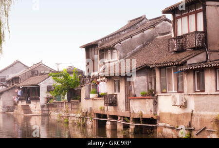 The buildings and water canals of Fengjing Town in Shanghai China on an overcast day. Stock Photo