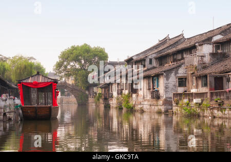 The buildings and water canals of Fengjing Town in Shanghai China on a sunny blue sky day. Stock Photo