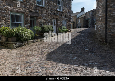 Cobbled street in Dent on The Yorkshire dales Stock Photo