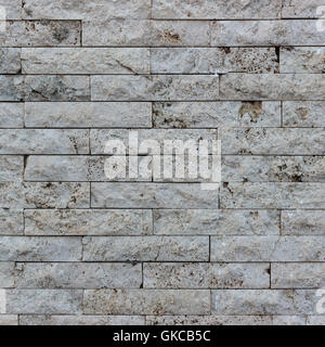 Wall of bricks in Vulcanic Stone, useful for background. Stock Photo