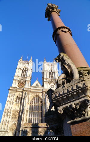 Westminster Abbey and scholars war memorial column in London, Great Britain Stock Photo