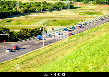 Looking down from North Lake Hefner Drive at traffic on West Hefner Road in North Oklahoma City, Oklahoma, USA on a summer day. Stock Photo