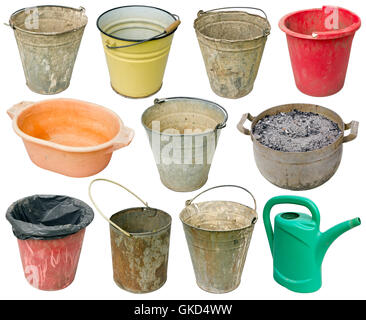 Rural real old used  metal and plastic buckets for water, garbage and weeds. One orange basin for washing of legs and a green wa Stock Photo