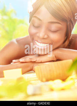 Beautiful bright joyful african woman in yellow dress Stock Photo - Alamy