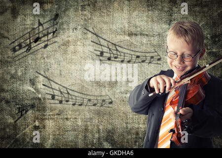 little boy has to play the violin joy Stock Photo