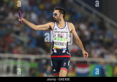 Great Britain's Martyn Rooney celebrates winning the Men's 4 x 400m Relay Round 1 - Heat 2 before Great Britain are disqualified at Olympic Stadium on the fourteenth day of the Rio Olympic Games, Brazil. Stock Photo