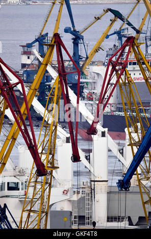 Marine cranes. Loading heavy loads. Cranes against the sky. Port ...