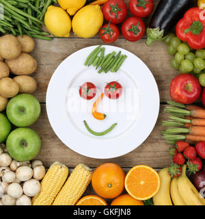 healthy vegan diet laughing face made of vegetables Stock Photo