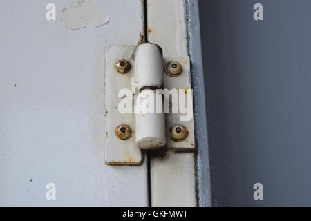 Hinges of a Rusty Door Stock Photo