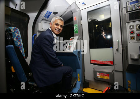 Mayor of London Sadiq Khan sitting in the drivers carriage of a Victoria line tube train at Brixton Underground station during the launch of London's Night Tube, as trains will operate overnight on Fridays and Saturdays on the Victoria line and parts of the Central line, with the Jubilee, Northern and Piccadilly lines following in the autumn. Stock Photo