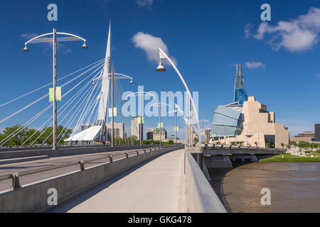 The Red River, Provencher Bridge and the city skyline of Winnipeg, Manitoba, Canada. Stock Photo