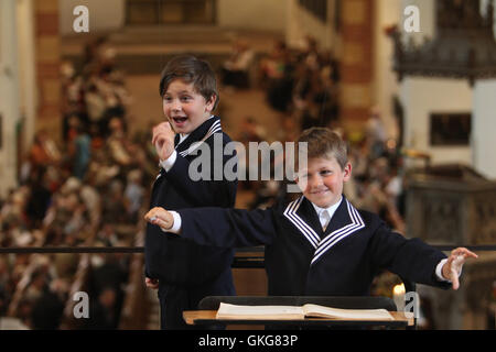 Leipzig, Germany. 20th Aug, 2016. Singers of the Thomaner choir at the Thomas church in Leipzig, Germany, 20 August 2016. Gotthold Schwarz was officially installed during a ceremonial act at the city hall. PHOTO: SEBASTIAN WILLNOW/dpa/Alamy Live News Stock Photo