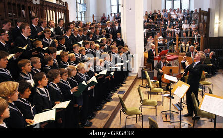 Leipzig, Germany. 20th Aug, 2016. New Thomas cantor Gotthold Schwarz conducting the Thomaner choir at the Thomas church in Leipzig, Germany, 20 August 2016. Gotthold Schwarz was officially installed during a ceremonial act at the city hall. PHOTO: SEBASTIAN WILLNOW/dpa/Alamy Live News Stock Photo