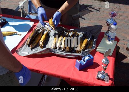 Zandvoort. 20th Aug, 2016. Photo taken on Aug. 20, 2016 shows smoked mackerels at the town of Zandvoort, the Netherlands. Around 25 smokers participated in a smoking mackerel contest here Friday, the third of this kind at Zandvoort. © Sylvia Lederer/Xinhua/Alamy Live News Stock Photo