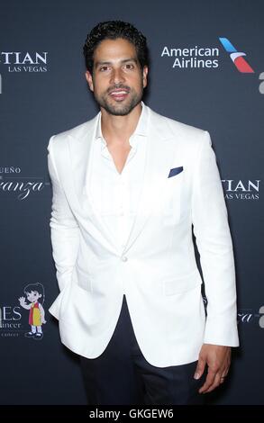 Las Vegas, NV, USA. 20th Aug, 2016. Adam Rodriguez at arrivals for All White Affair 16th Annual El Sueno de Esperanza Celebration Benefitting Children with Cancer, The Venetian Resort Hotel Casino, Las Vegas, NV August 20, 2016. Credit:  MORA/Everett Collection/Alamy Live News Stock Photo