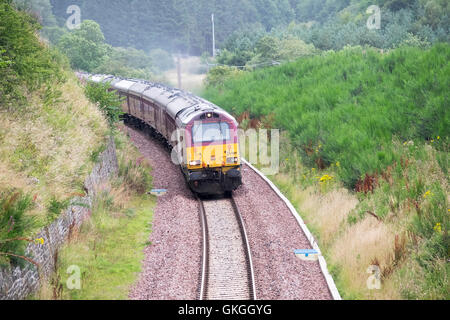 Galashiels, Borders Railway, Whin Bridge, UK. 21st Aug, 2016. Steam train on Borders Railway. A steam special running on the Borders Railway on Sundays during August and September, pictured here on its return journey from Tweedbank to Edinburgh Waverley Pictured here is the Class 67 Diesel Electric locomotive 67009, in the English Welsh and Scottish Railway livery pulling the carriages and steam engine 46100 'The Royal Scot' back to Edinburgh Waverley. (Photo: Rob Gray) Credit:  Rob Gray/Alamy Live News Stock Photo