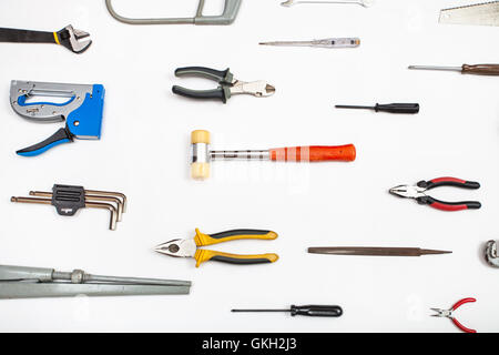 various hand tools arranged on white background Stock Photo