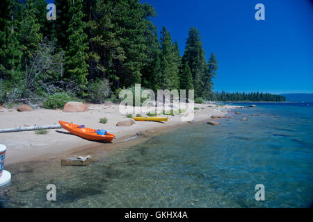 Kayaks on the shore of Lake Tahoe shoreline at D.L. Bliss State Park, California Stock Photo