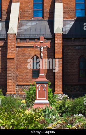 Crucifixion in the courtyard of the Polish church Stock Photo