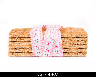 Diet Crispbread and measuring tape isolated Stock Photo