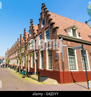 Row of houses with stepped gables in Groot Heiligland street in old town of Haarlem, Holland, Netherlands Stock Photo