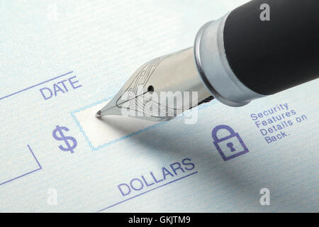 Bank Check and Fancy Pen with Copy Space. Stock Photo