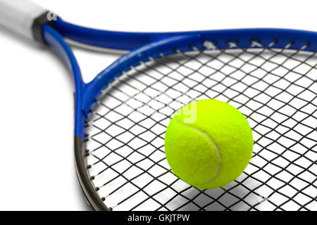 Blue and Black Tennis Racket with Green Ball Isolated on White Background. Stock Photo