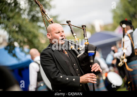 Participants take part in 2016 World Pipe Band Championships grade one qualifiers at Glasgow Green. Stock Photo