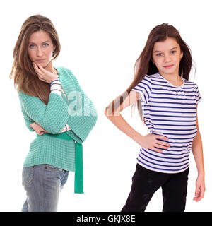 Close up portrait of a beautiful ten year old little girl and happy mother, isolated on white background Stock Photo