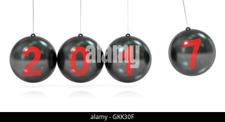 Happy New Year 2017 concept, balancing balls Newton's cradle. 3D rendering isolated on white background Stock Photo