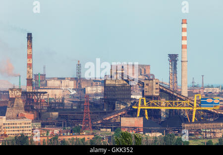 Industrial landscape. Steel factory with pipes at sunset. Metallurgical plant. steelworks, iron works. Heavy industry in Mariupo Stock Photo