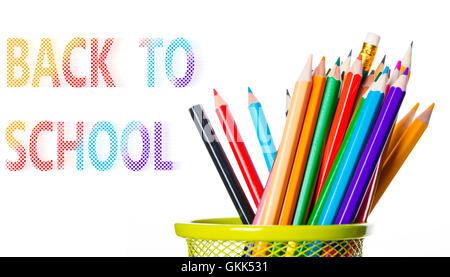 basket with colored pencils on white background Stock Photo